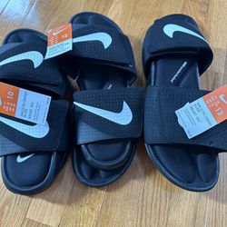 Three Pair Of Nike Slides - $100