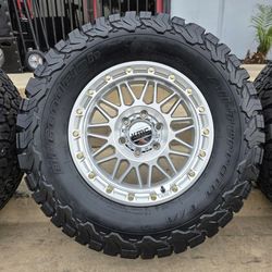 17" KMC rims w/ 33" BfGoodrich T/A KO2 tires