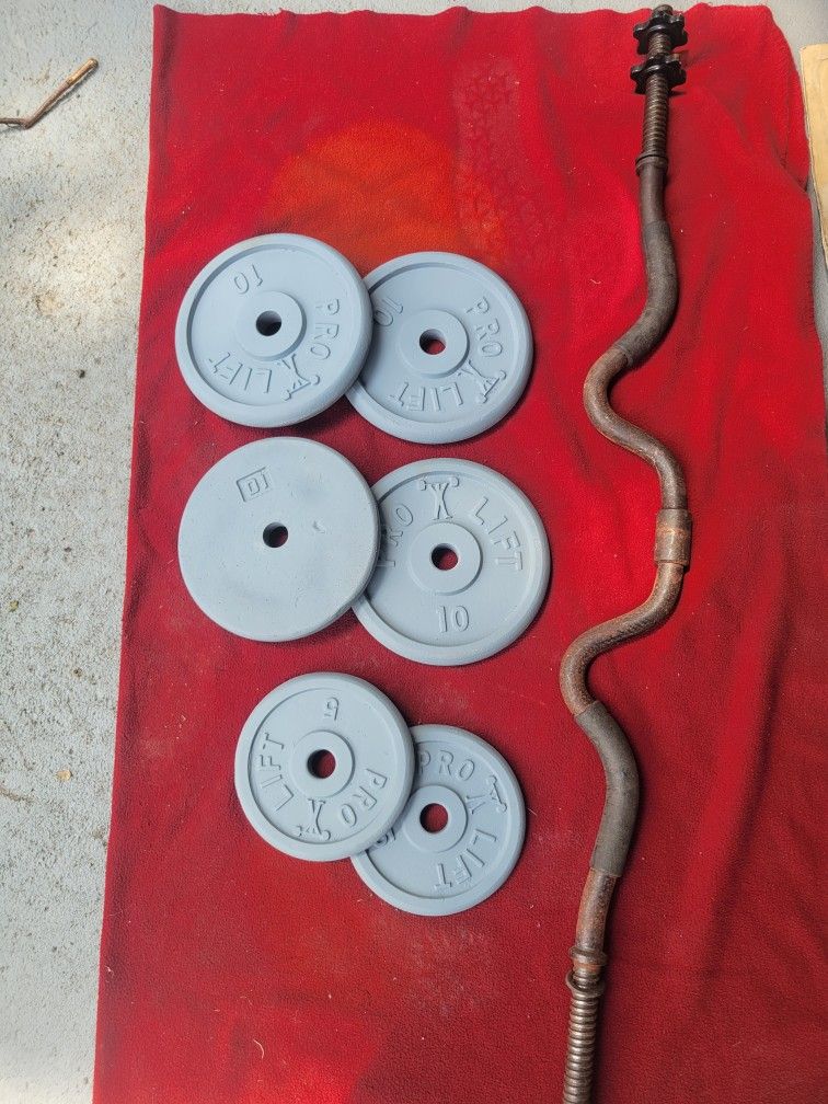 1" HOLE  EZ-CURL BAR AND 50LBs
2-5s.     4-10s.  
11525 S HALSTED DUNKIN DONUTS/7111.S WESTERN WALGREENS 
50$  CASH ONLY AS IS 