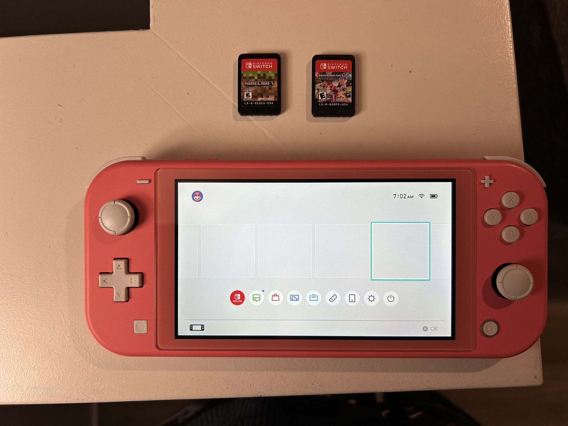 Nintendo Switch Lite (coral) With Games