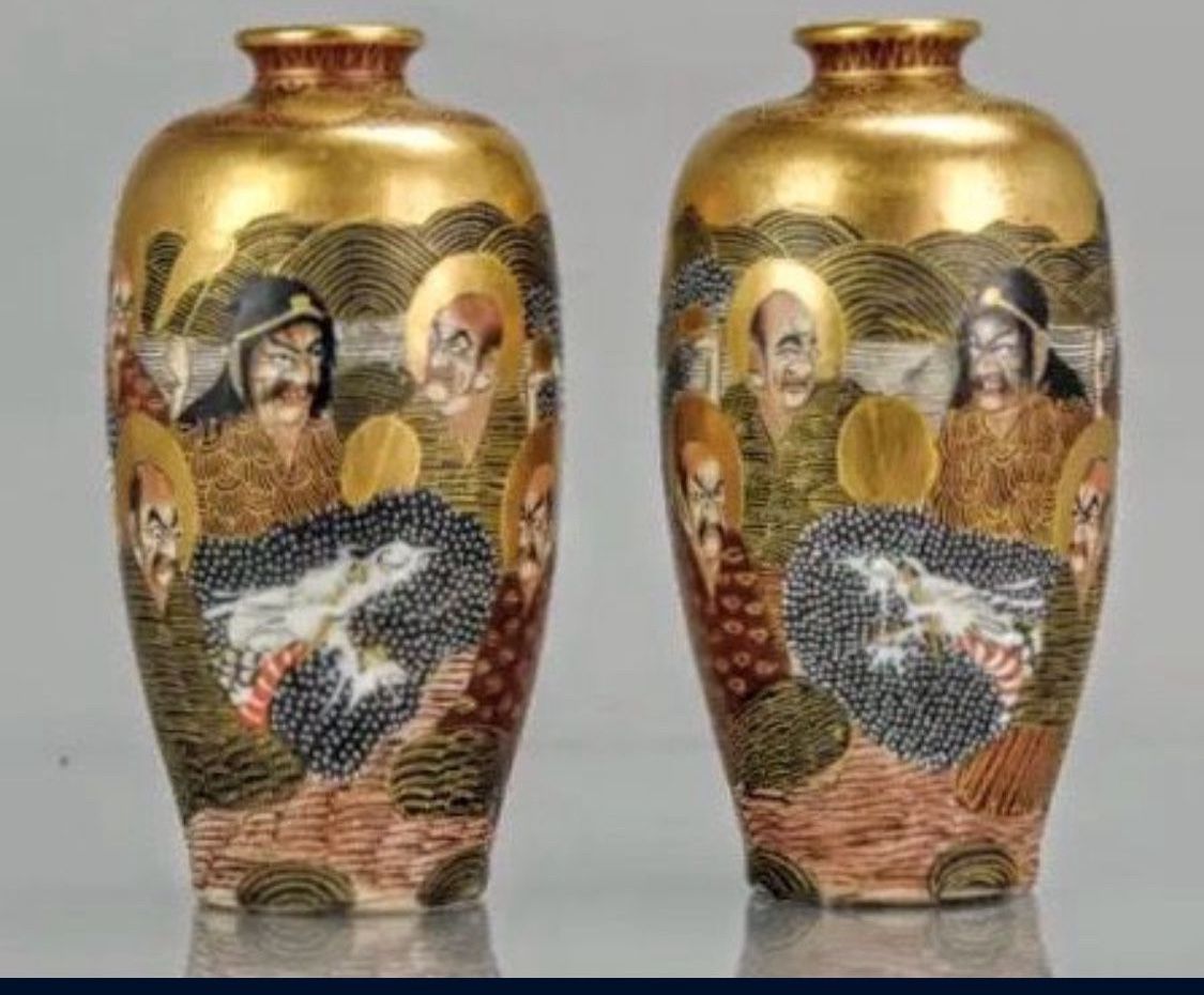 pair of Japanese Satsuma mirror vases features intricate designs of Immortals in the 1000 Faces pattern.