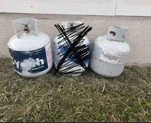 2 empty propane tanks  ($10 )