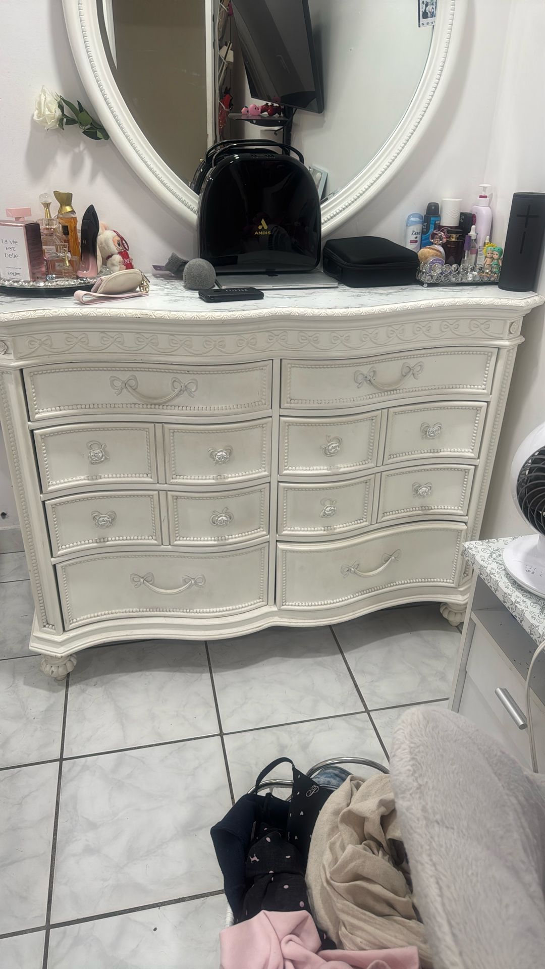 dresser and mirror (doesn’t include what’s ontop of dresser only includes mirror)