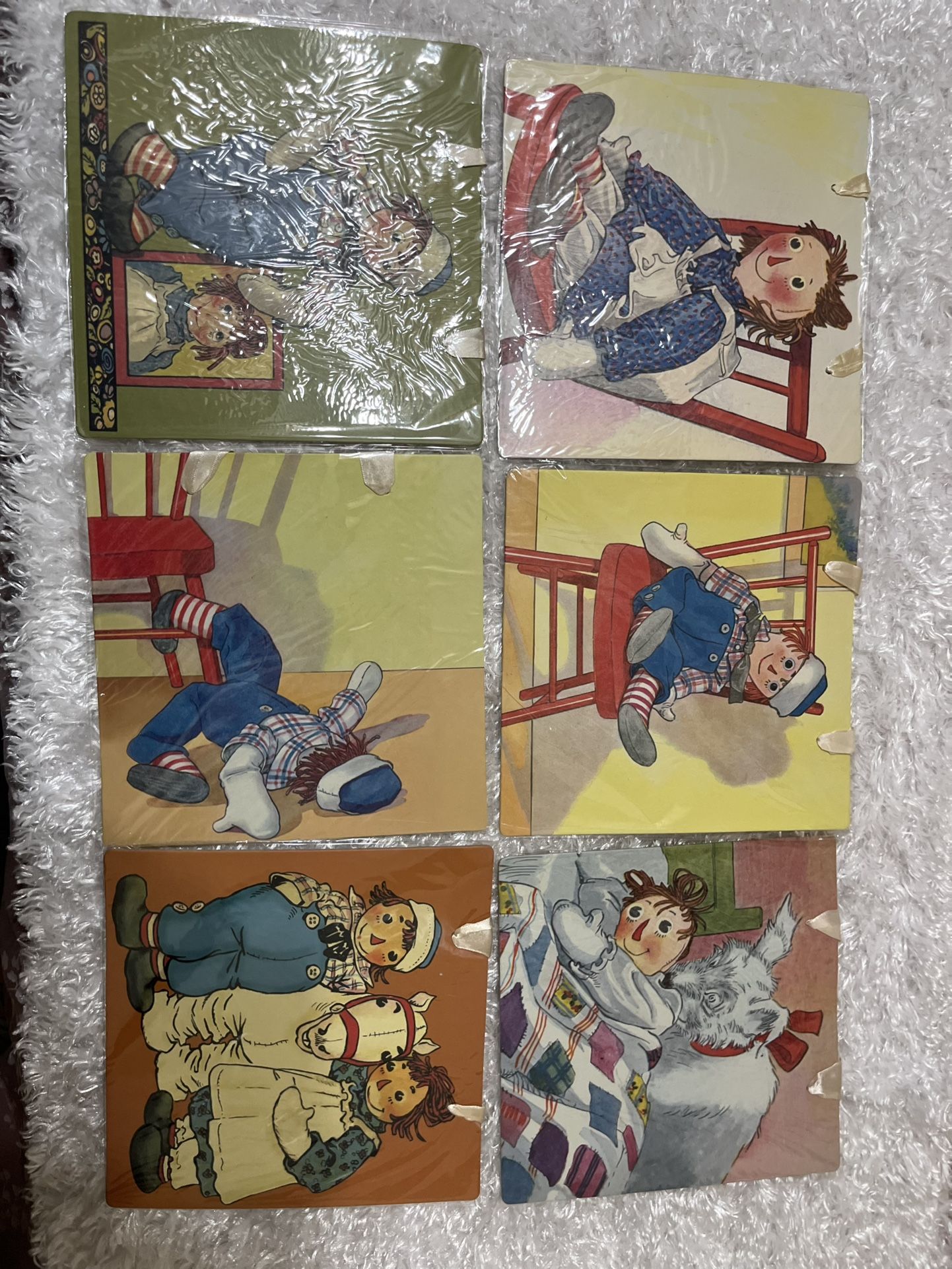 T.J. Whitneys’ Traditional Toys - Raggedy Ann & Andy Raggedy Ann & Andy  Board Wall Hanging with Ribbon. Sealed. Set Of 7 Pieces