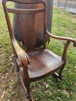 Antique Wood Rocking Chair with Carved Feet
