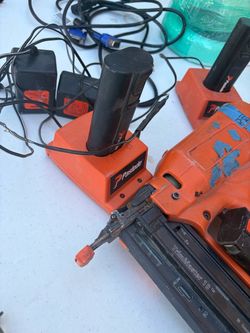 Paslode trim gun with two extra batteries and chargers