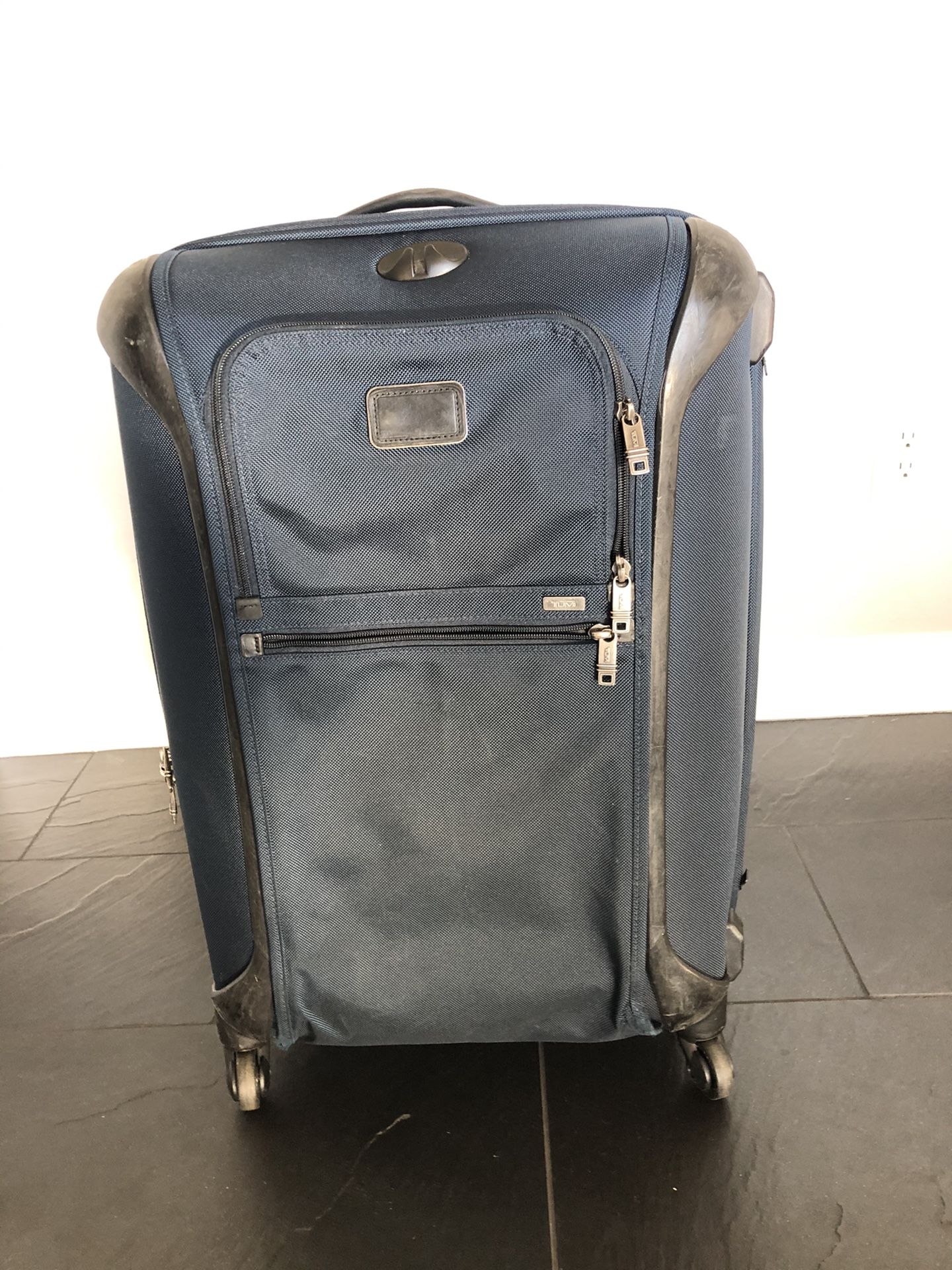 Tumi Alpha 26 Inch Four Wheel luggage case: $875