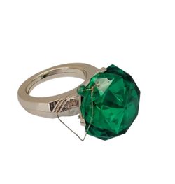 Holiday Tree Ornament Plastic Oversized Green Plastic Faux Gemstone Ring Decor. This Holiday Tree Ornament is a large green plastic decoration designe