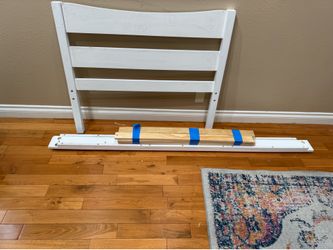 White wooden twin bed frame