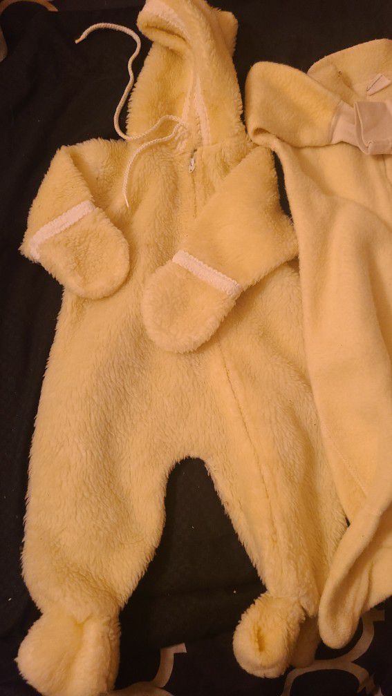 Baby Yellow Boy Or Girl fuzzy fleece 0-9, middle up to 28"/ 15-20 lb, right sleeper same. East West