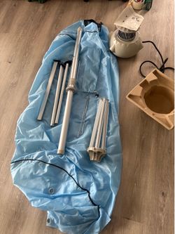 Portable heated clothes dryer