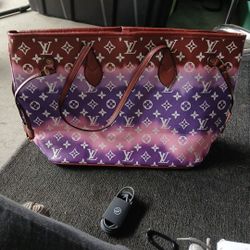 Louis Vuitton On The Go Handbag