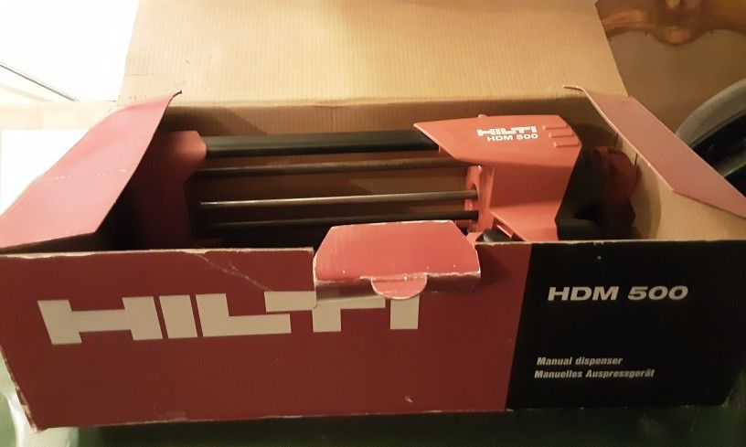 HILTI HDM 500 Manual Anchor Adhesive dispenser & red cartridge