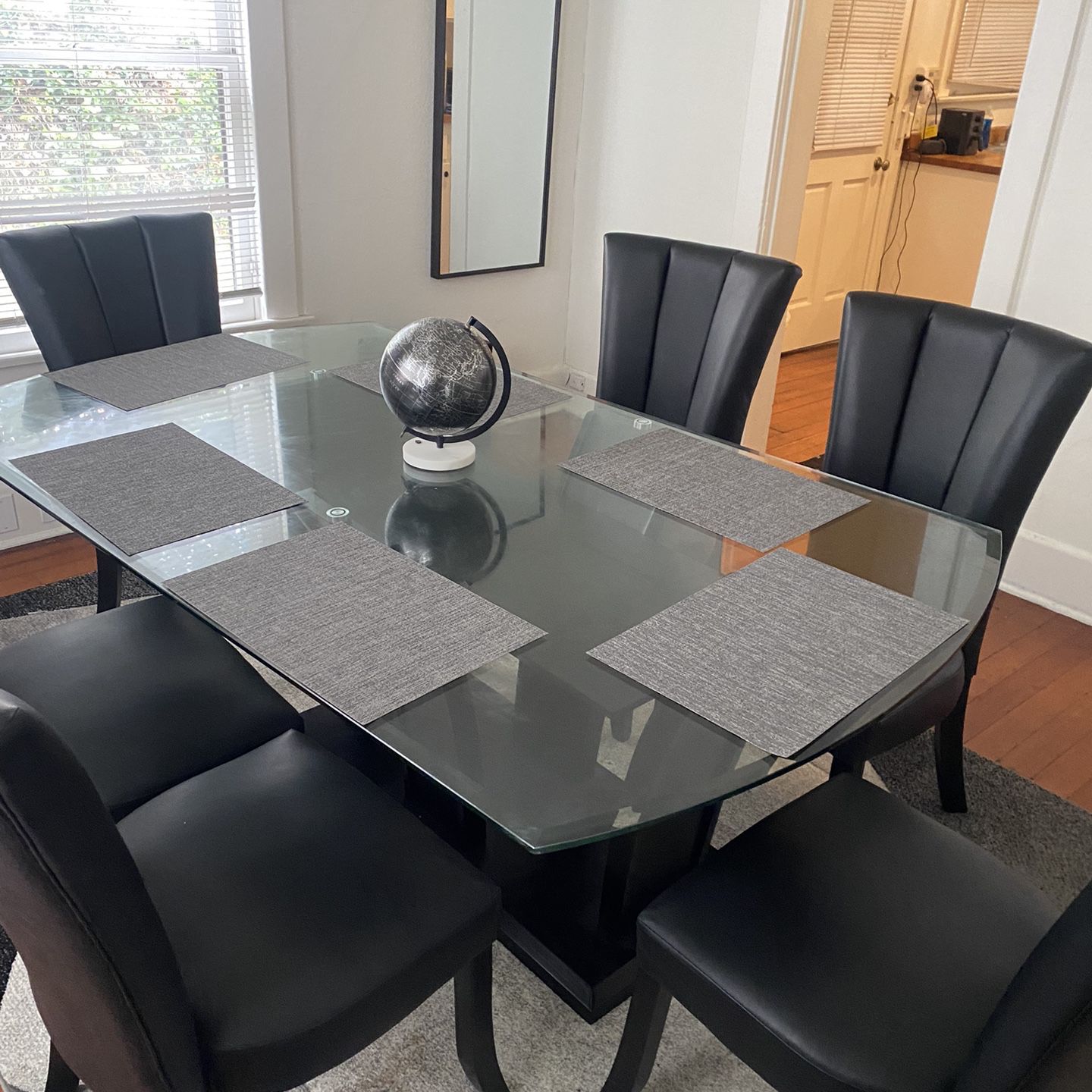 6 piece glass dinning table set, chairs and table squares included