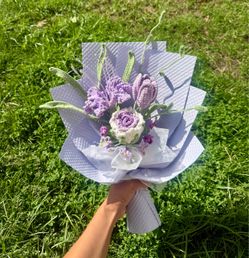 Crocheted purple rose and tulip bouquet