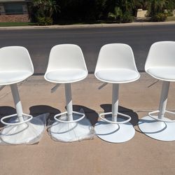 Brand New Set Of Four Adjustable Height Bar Stools