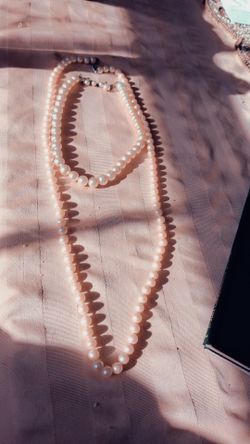 Pearl necklaces with ornament c 2003 T&Co. 925