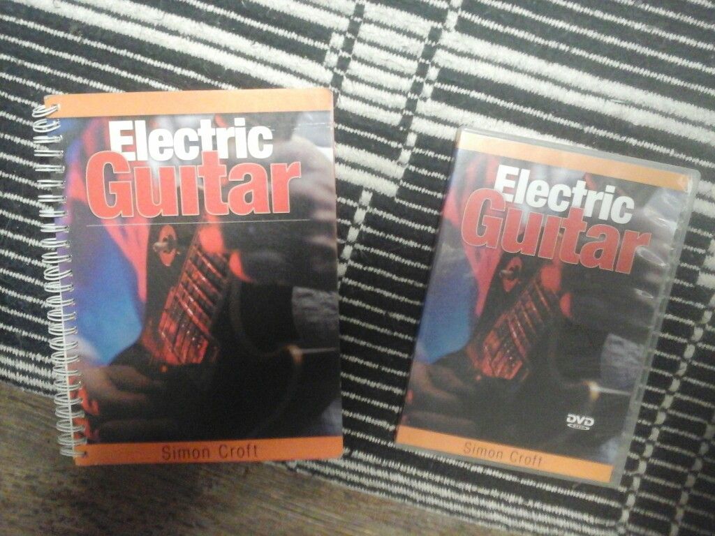 Electric guitar instructional video and book