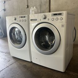LG  WASHER AND ELECTRIC DRYER 