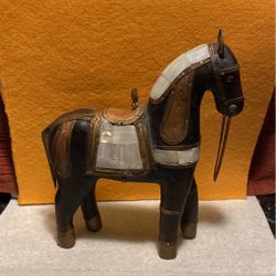 Wooden horse figurine.