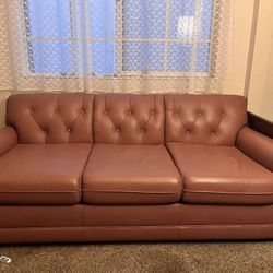 vintage pink couch with pullout bed