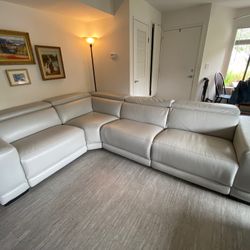 Luxurious Light Grey Triple Recliner Leather Sectional – Only $1,100!