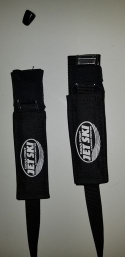 Kayak roof top straps with buckle padding to protect kayak.