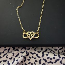 Women’s Gold Necklace With Crossed Heart Pendant 