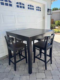 IKEA high top dining table with 4 chairs
