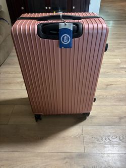 Large rose gold suitcase
