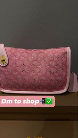 Black and light pink coach bag with rhinestones
