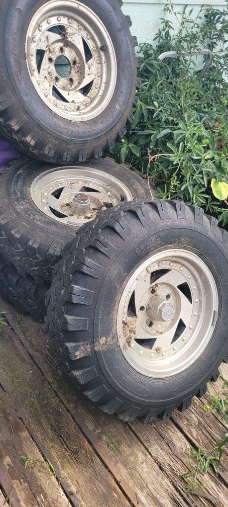 15" RIMS W/TIRES "Sandel" Off a 92' CHEVROLET S-10 BLAZER. 5 LUG
