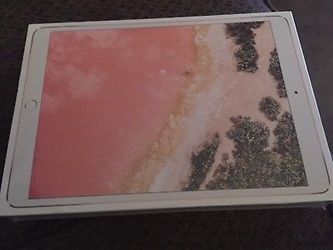 Brand new in the box only a day old rose gold 64g iPad pro