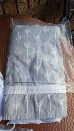 Grey and white dust ruffle for crib