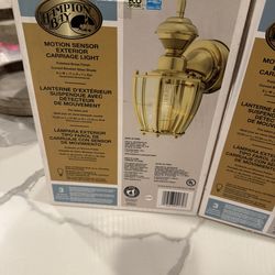 Two Hampton Bay Exterior Sensor lights