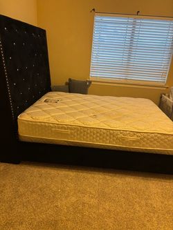 Black tufted bed frame