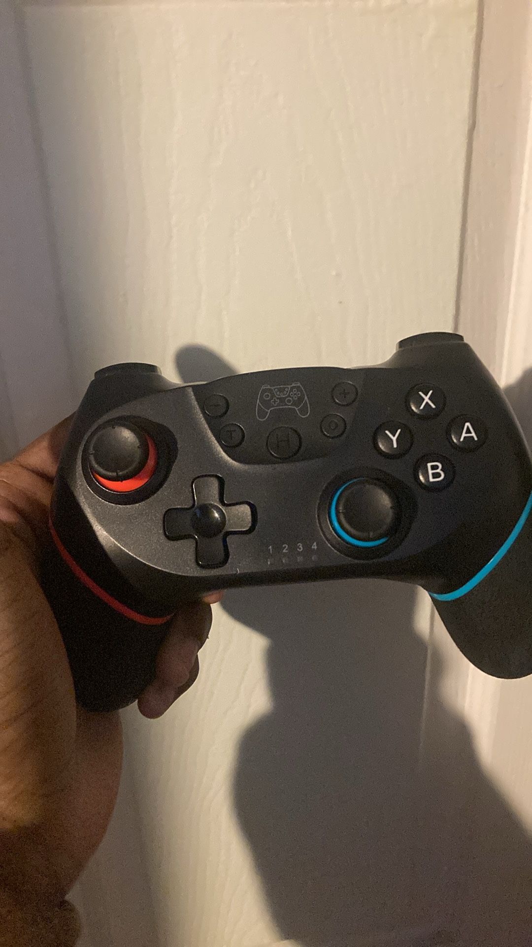 nintendo switch with 3 controllers