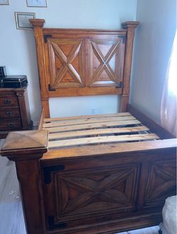 Queen size bedroom frame solid wood very heavy.