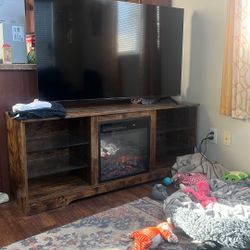 55 In Vizio And Tv Stand With Fire Place 