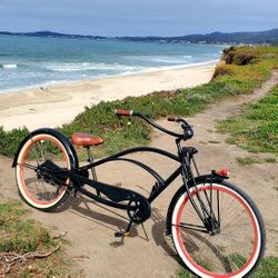 CUSTOM STRECHTED BEACH CRUSIER BIKE...HAS LED KIT ON WHEELS RED ..FRONT HEADLIGHT AND TAIl LIGHT ..Has Custodrym Seat ,Grips,...Very Unique!!