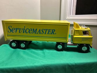 Vintage ERTL Steel  18 wheels Semi Truck Tractor Trailer ServiceMaster in great condition
