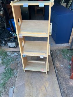 A wood shelf it’s 48 inches tall  20 wide and