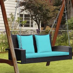 2 person wicker hanging porch swing with 2 back cushions and seat cushion.