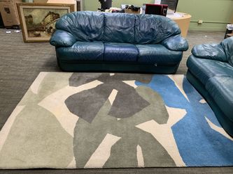 Learher furniture coach and love seat and rug