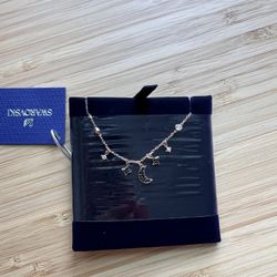 swarovski star and moon rose-gold plated necklace