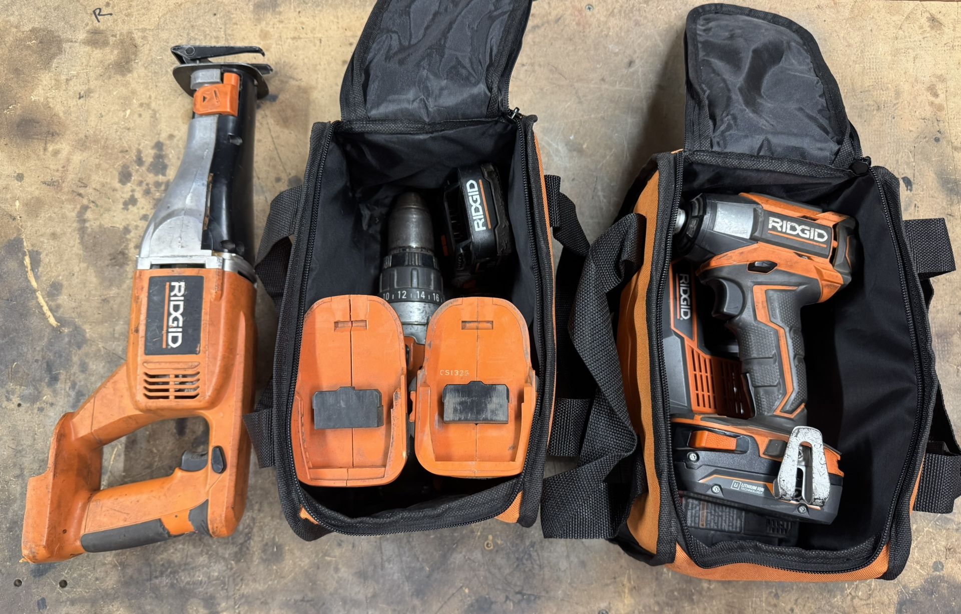 Ridgid Drills Driver And Swazall Batteries And Charger 