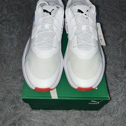 Size 11.5, men’s brand new unworn Puma shoes with tags and box.