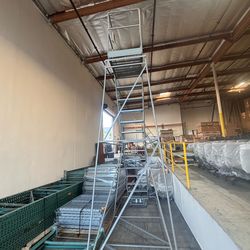 Mobile stairs , 14 steps , Make : U line semi new