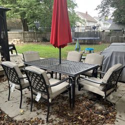 Outdoor Patio Table, Chairs And Umbrella 