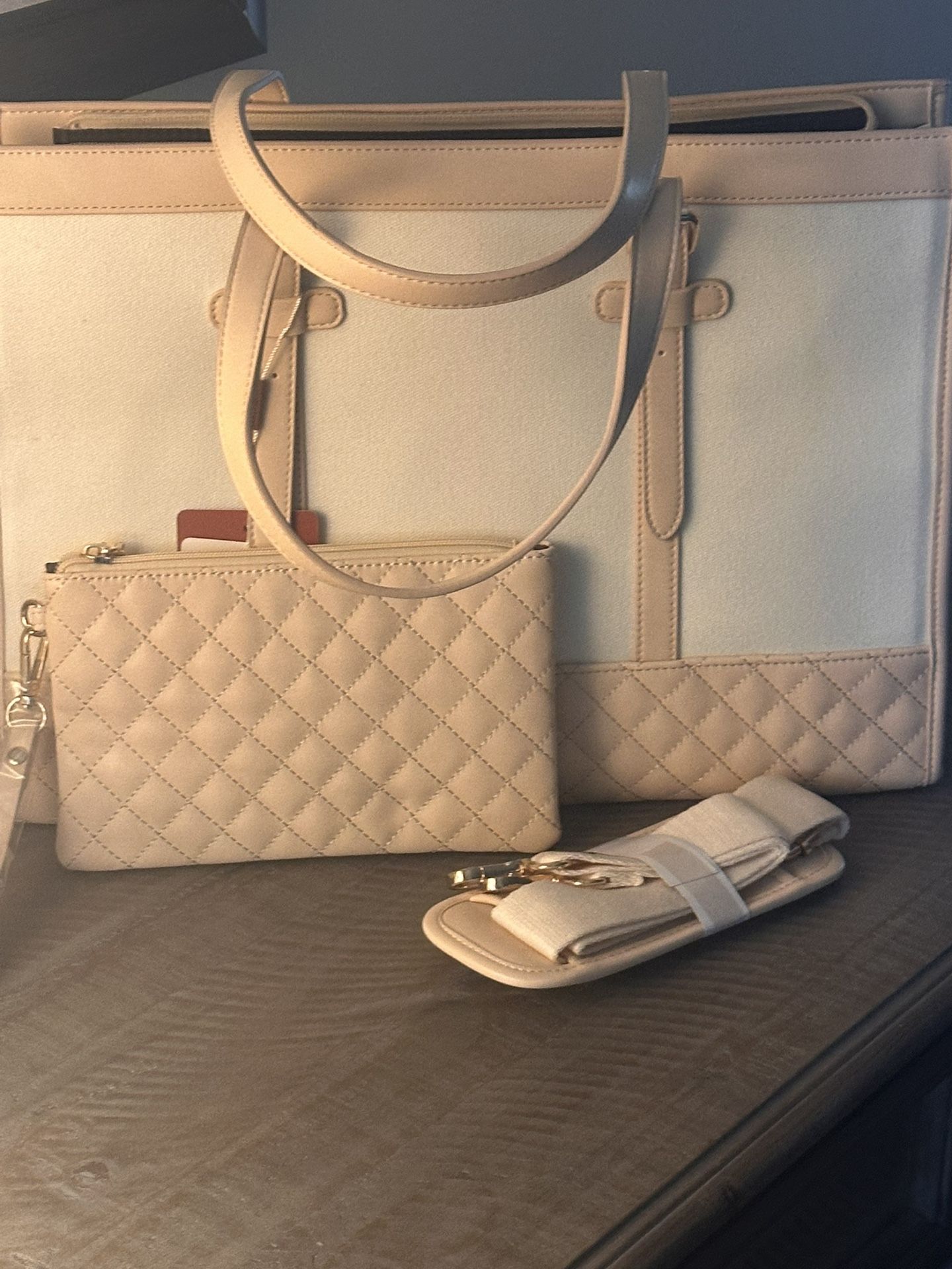 BRAND NEW Cream Colored Essentials Bag.
